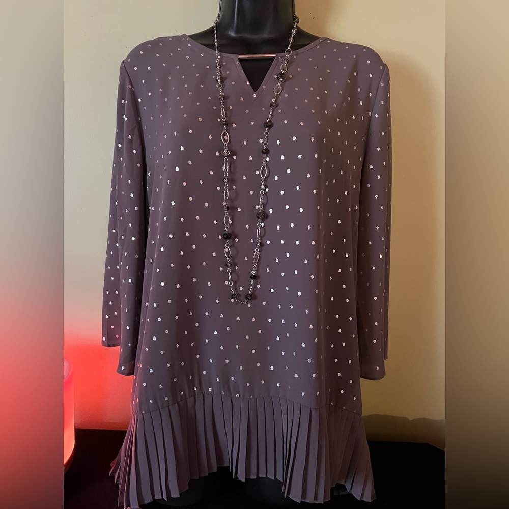 Beautiful blouse. Sparkles. Comfortable yet chic for gatherings.